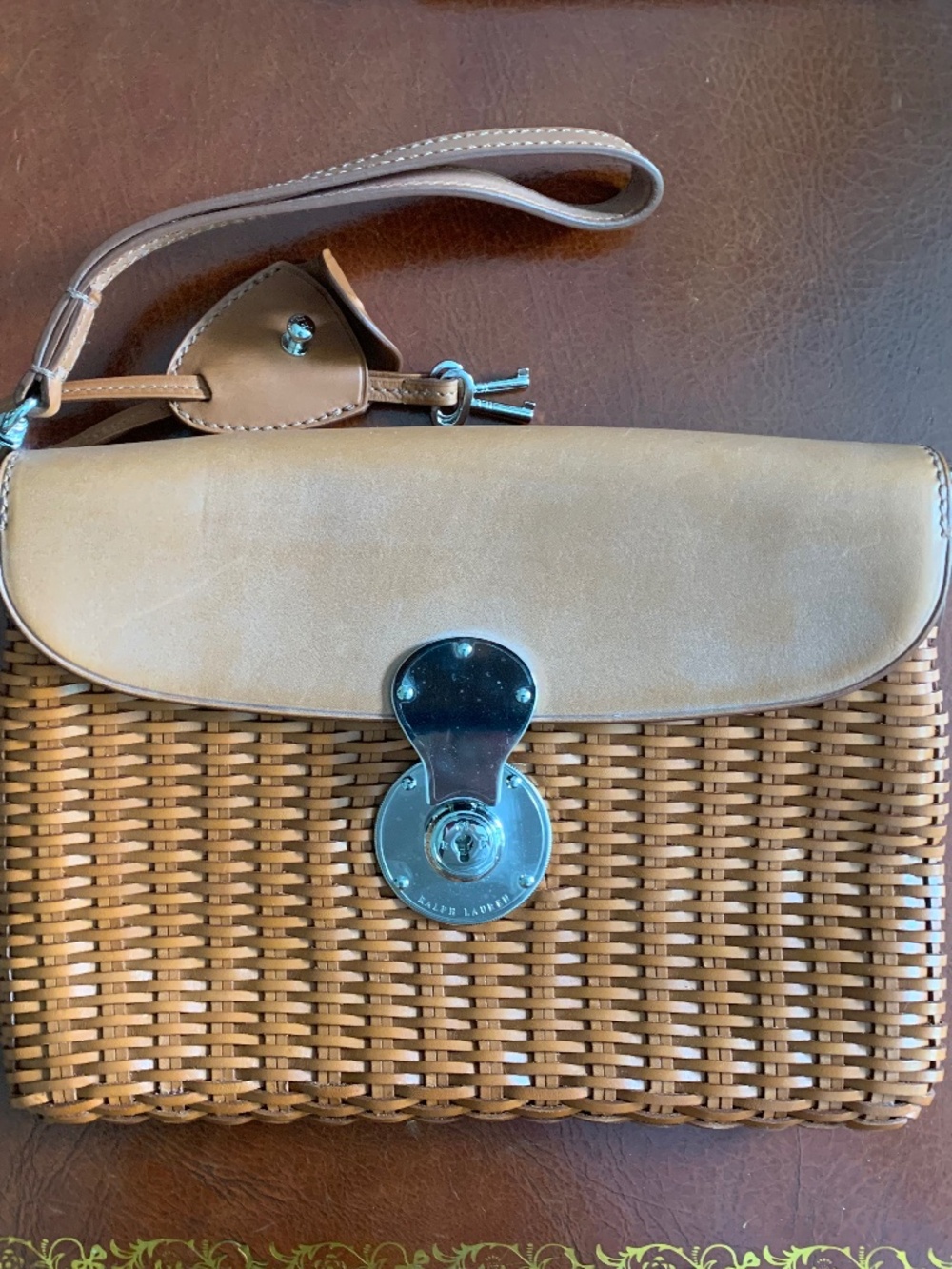 Ralph Lauren handbag,  10" w x 7" H, brown leather basket weave, keyed clasp